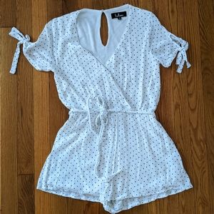 Black and white polka dot romper
